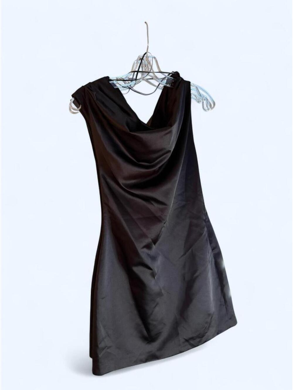 Black mini dress with cowl neckline and ruched details